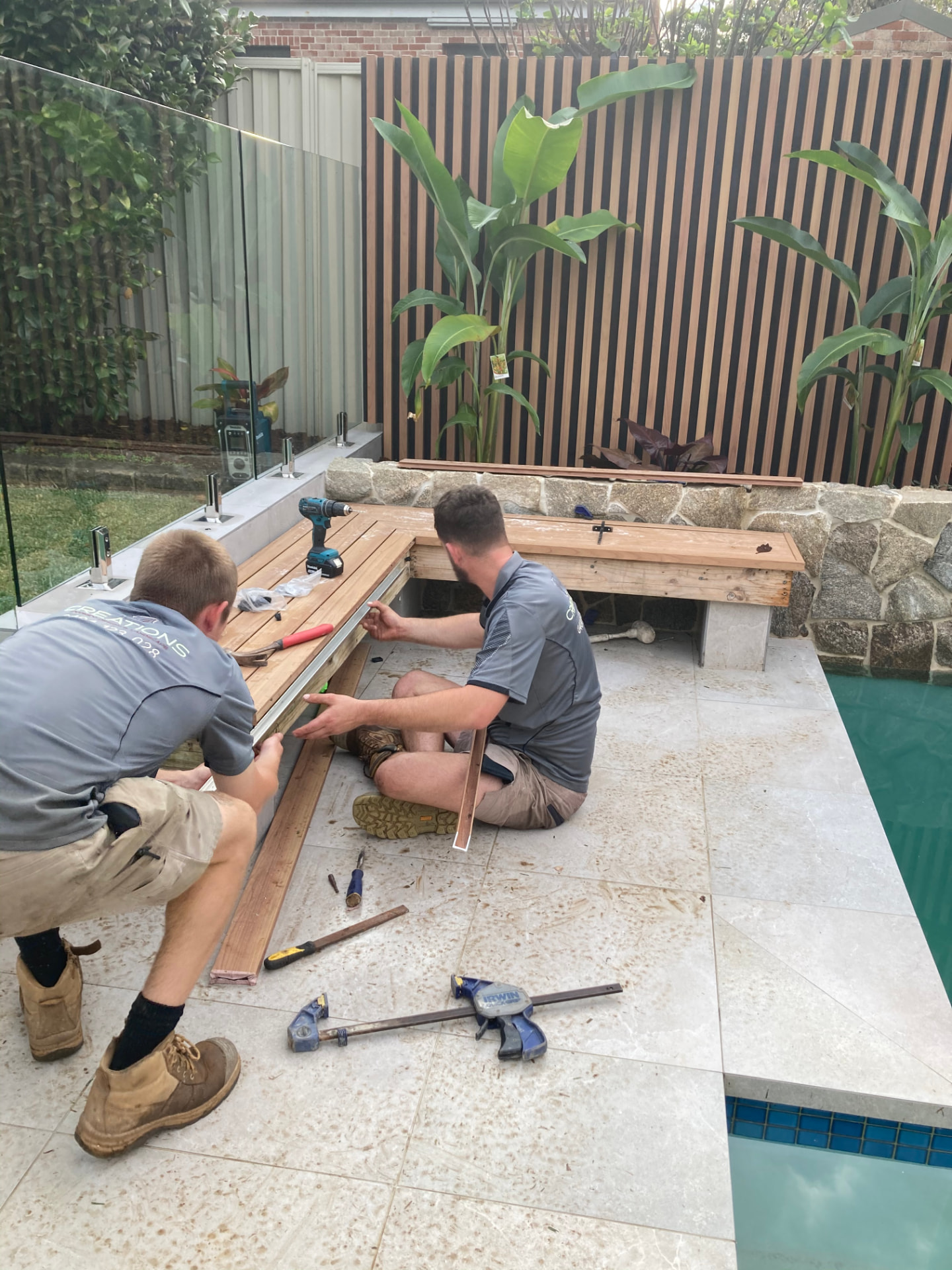 During construction - building the timber bench seating beside the North Ryde pool