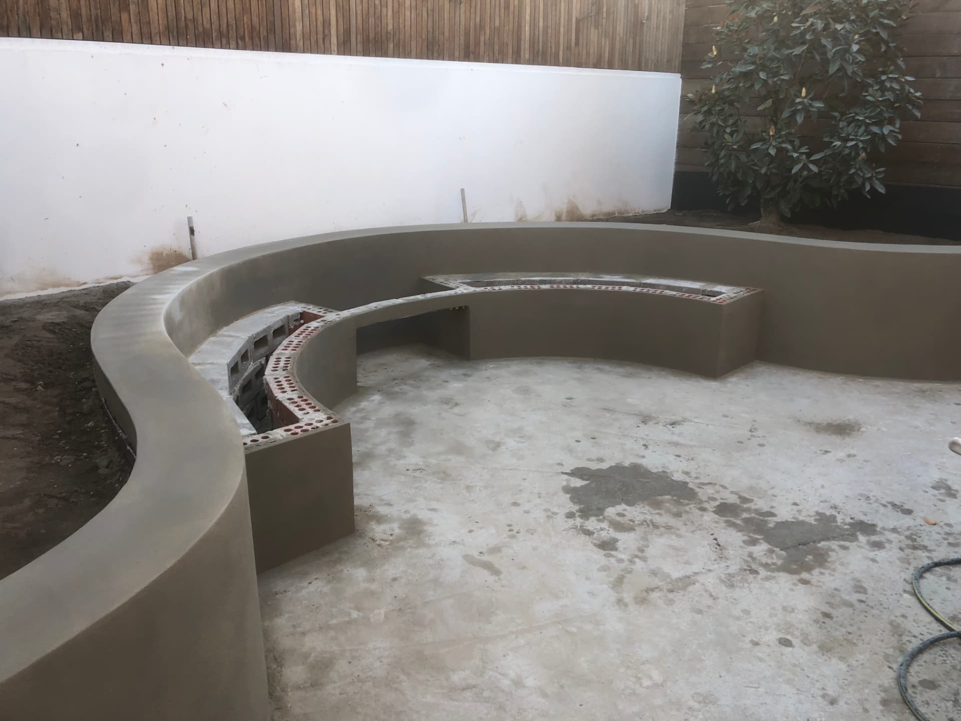 Before - rendered walls and slab laid ready for tiling during the Wareemba works