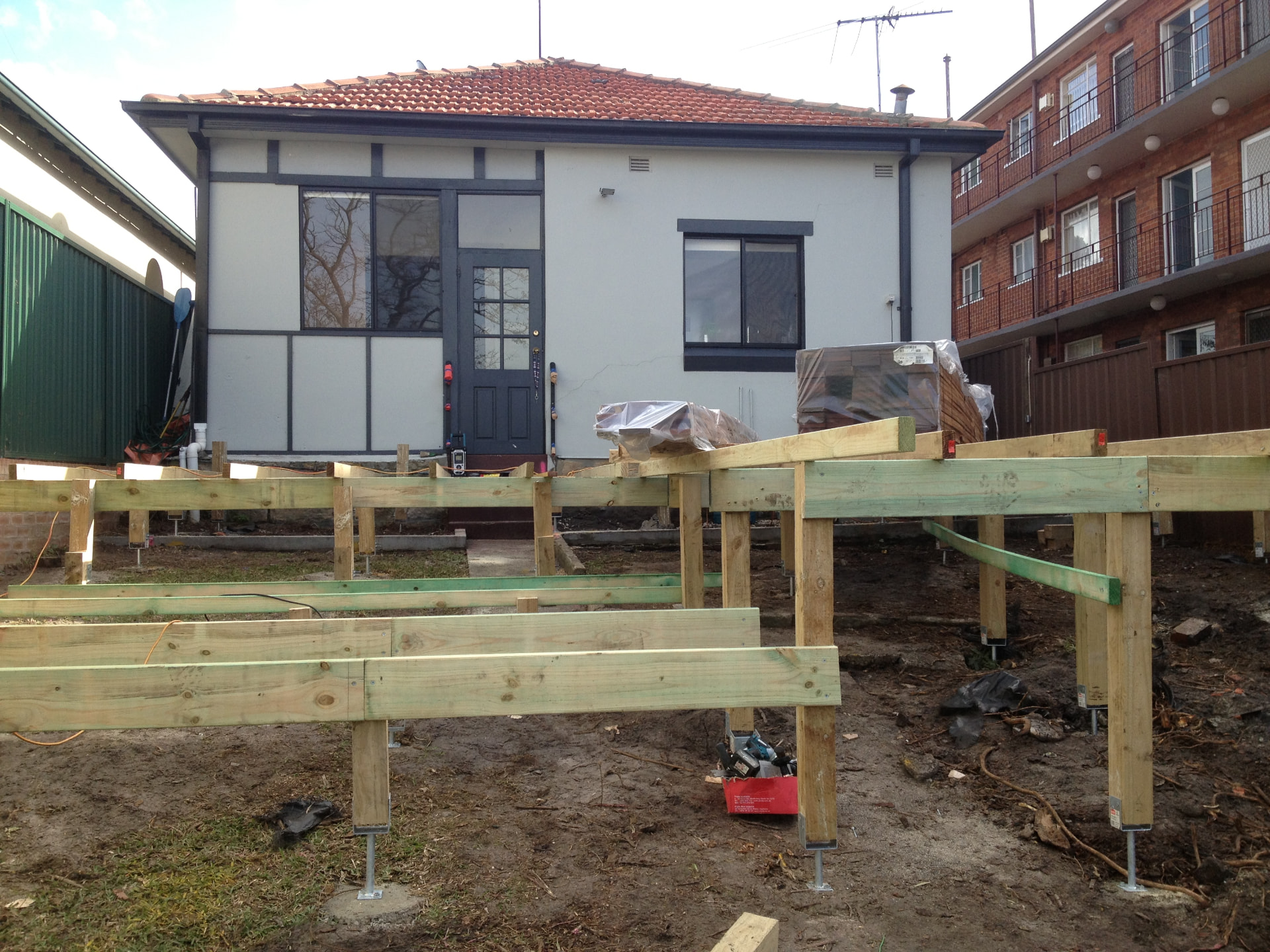 Before - rear deck framing underway at the Kingsford home