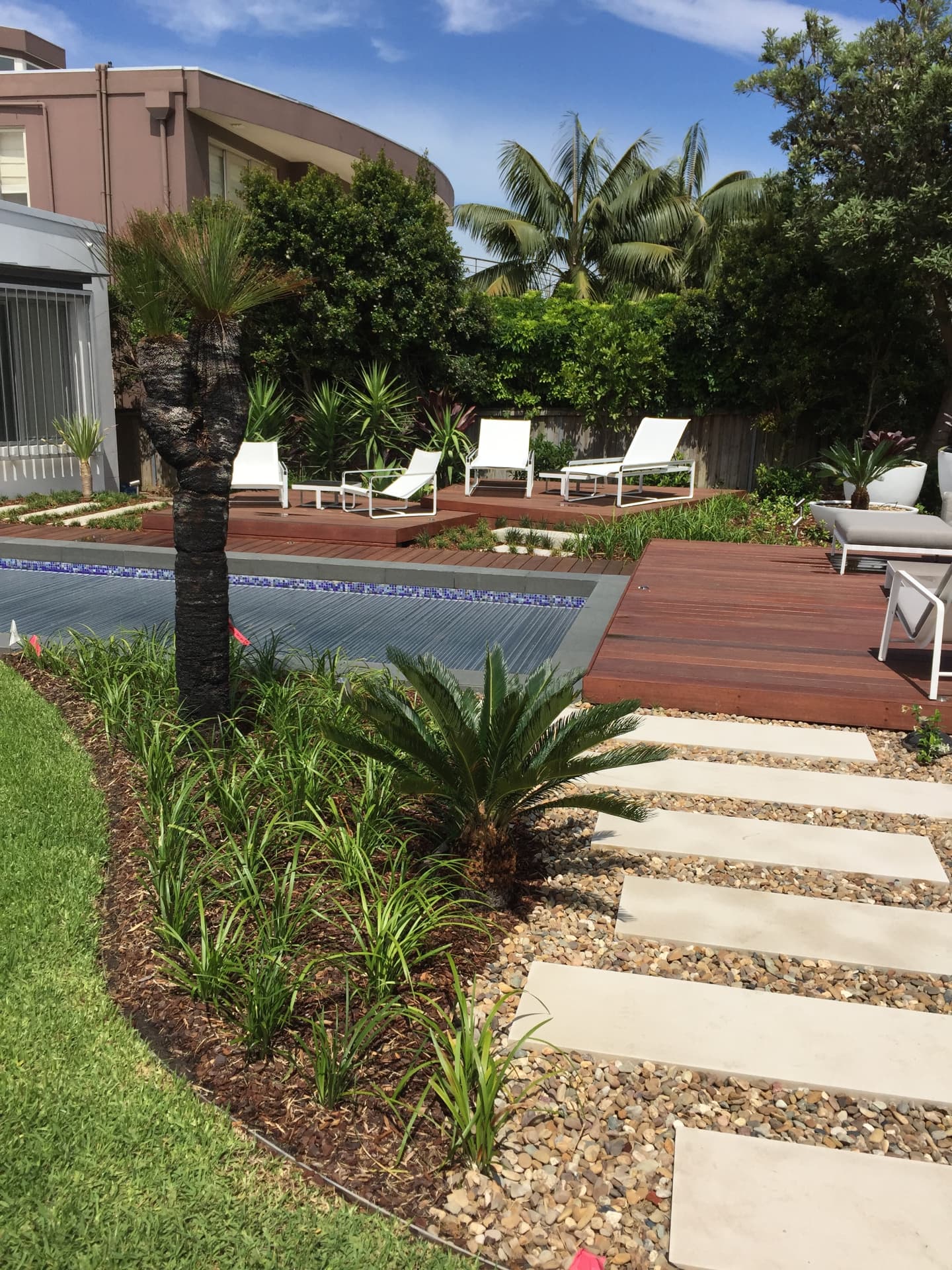 Step stone path through new gardens to the Dover Heights pool and timber decking