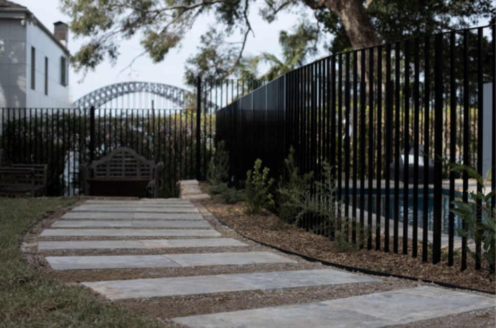 Step stone pathway beside the pool with Harbour Bridge views