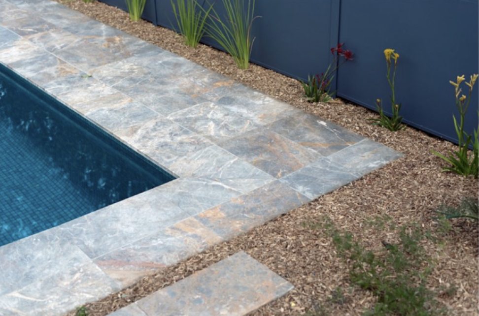 Pool coping and paving detail with new garden edging