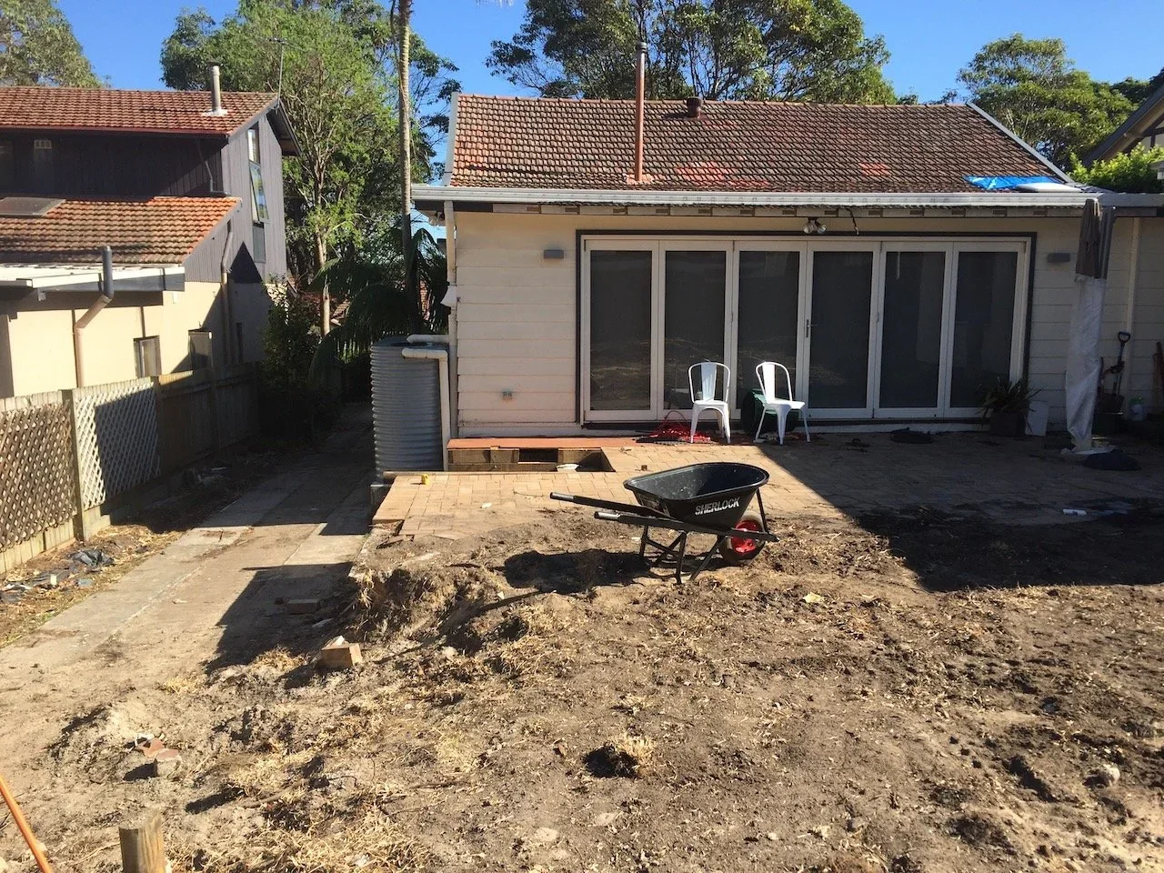 Before - the Chatswood backyard excavated back to bare ground before construction