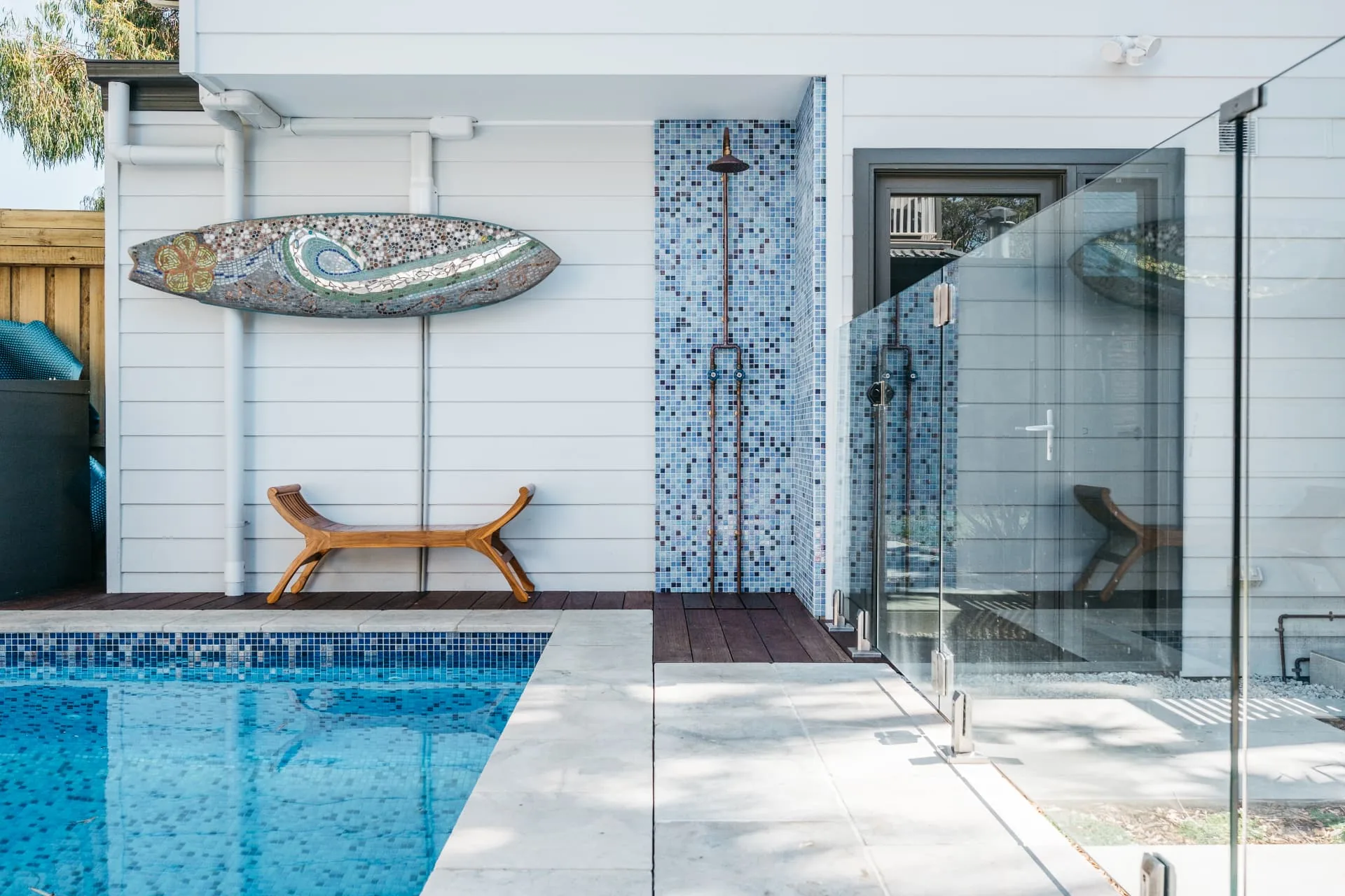 Outdoor pool shower beside the renovated Freshwater pool