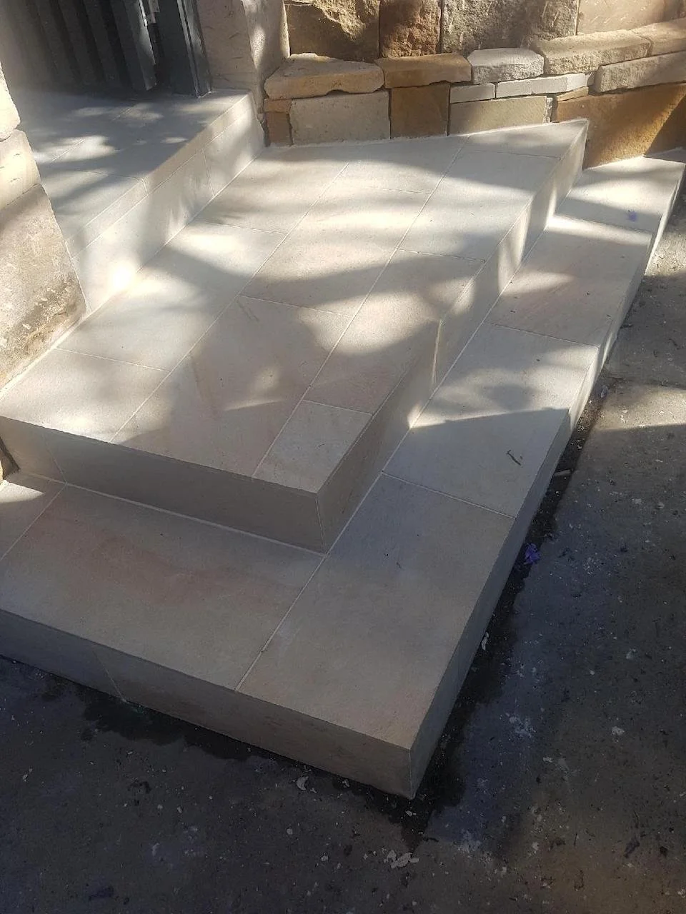 New stone clad and capped entry steps at the Mosman property