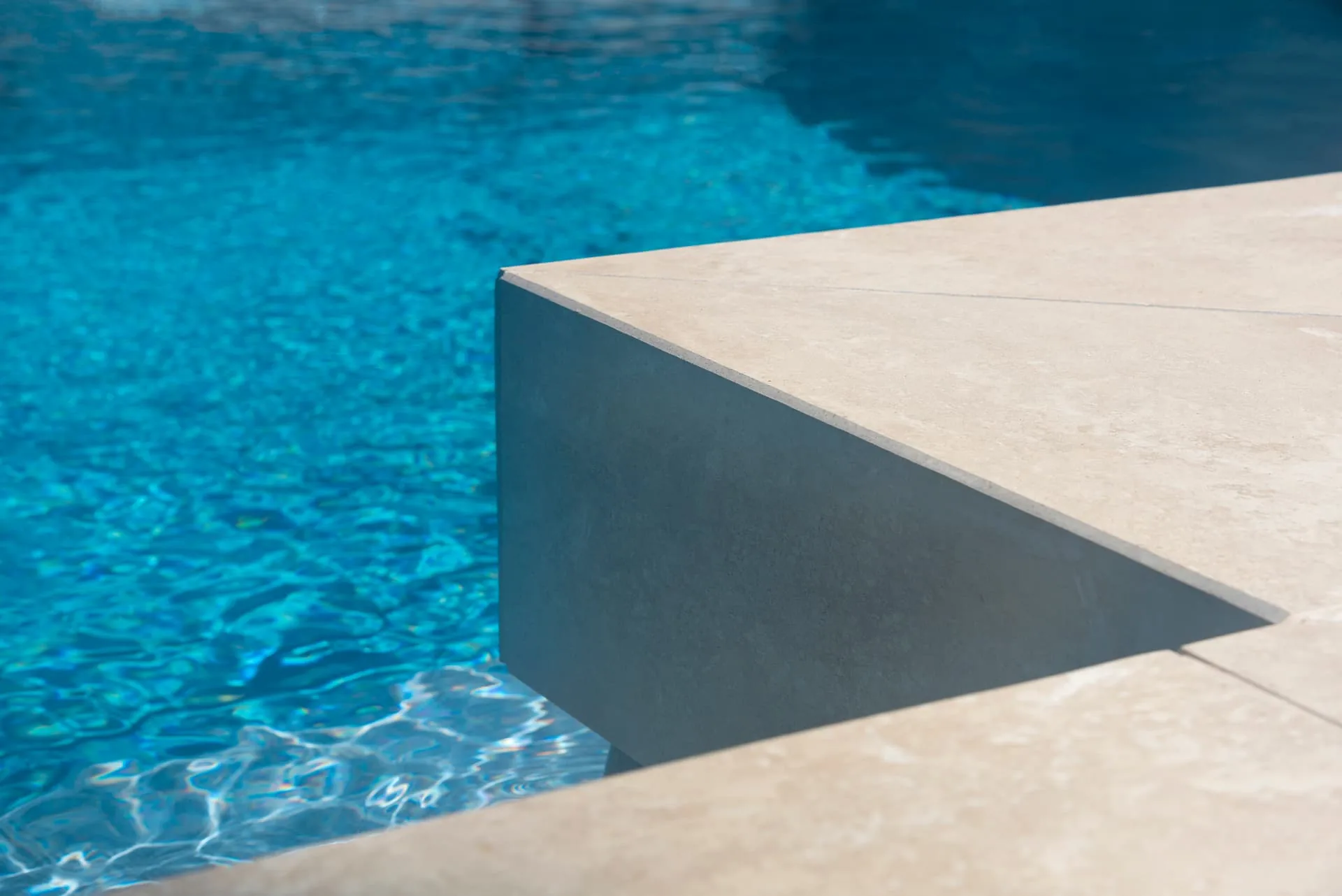 Detail of the pool coping and tiled pool edge at Riverview